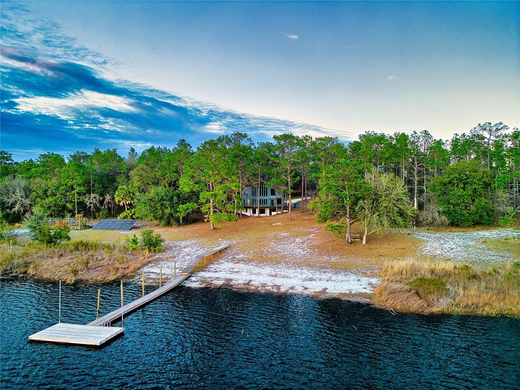 Photo of 123 Mason Lake Trail, Hawthorne, FL 32640 (MLS # GC538469)