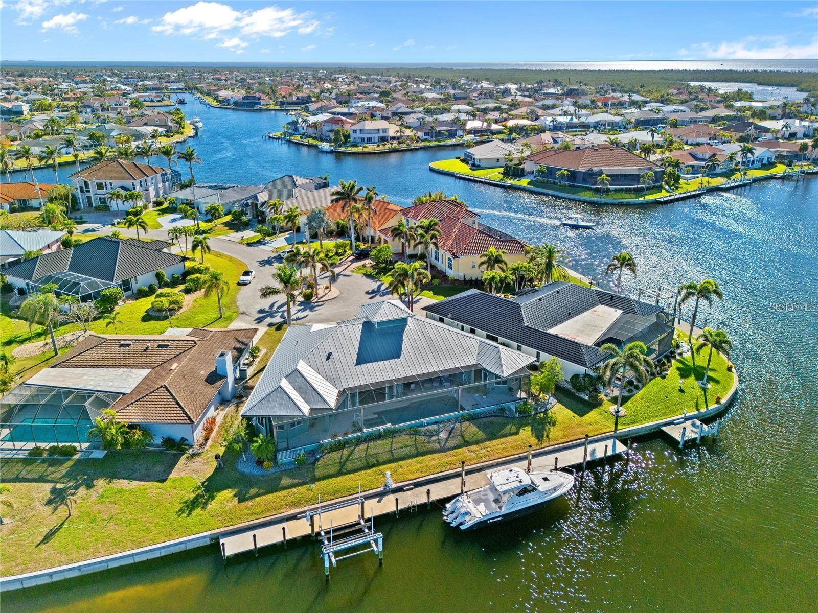 Welcome to your waterfront paradise in Punta Gorda Isles, one of the most desirable boating communities in Southwest Florida. This Gulf-access canal home offers the perfect combination of luxury, location, and lifestyle, making it a top choice for buyers searching for Punta Gorda waterfront homes for sale. Located on a quiet cul-de-sac, this property provides quick boating access to Charlotte Harbor and the Gulf of Mexico, ideal for fishing, sailing, and sunset cruises; 3 spacious bedrooms and 2 full bathrooms, perfect for comfortable Florida living, Expansive waterfront views from the living room, kitchen, and primary suite, Private boat dock and seawall with direct Gulf access—a rare find in Punta Gorda real estate, Gourmet kitchen featuring granite countertops, stainless steel appliances, and custom cabinetry, Open-concept floor plan filled with natural light and modern finishes throughout, Primary suite retreat with walk-in closet, spa-style bathroom, and peaceful canal views, Lush tropical landscaping and a large screened lanai, perfect for entertaining or relaxing by the water
This Punta Gorda canal home is just minutes from downtown Punta Gorda, Fishermen’s Village, golf courses, parks, shopping, and top-rated Southwest Florida restaurants. Whether you enjoy boating, fishing, or beach days, this Charlotte Harbor boating home places you at the center of it all. Punta Gorda is known for its charming waterfront lifestyle, friendly community, and easy access to Gulf Coast beaches.
Why Buyers Love This Punta Gorda Waterfront Property:
Homes like this are highly sought-after due to their location, Gulf access, and boating convenience. With its ideal setting on Brazilia Court, this home checks all the boxes for those searching for luxury waterfront homes in Punta Gorda Isles and Florida canal homes with boat docks.
Schedule Your Private Tour:
Don’t miss your opportunity to own this exceptional Punta Gorda waterfront home at 2580 Brazilia Court.