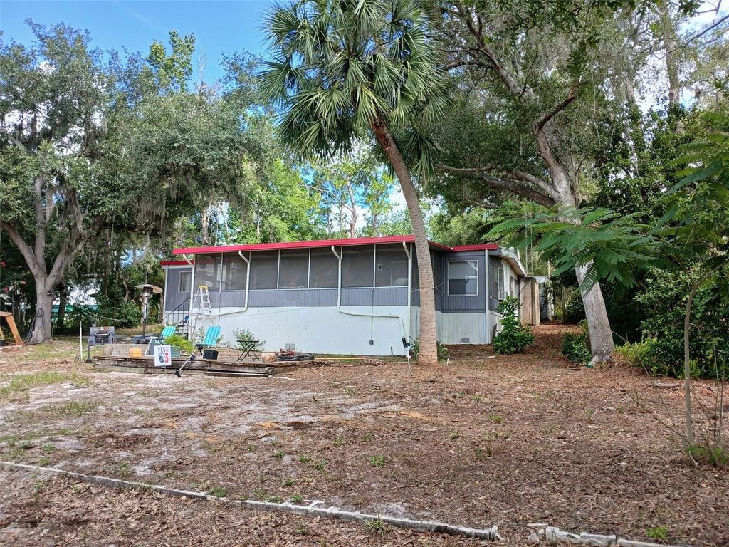 Photo of 17010 SE 61st Place, Ocklawaha, FL 32179 (MLS # OM709614)