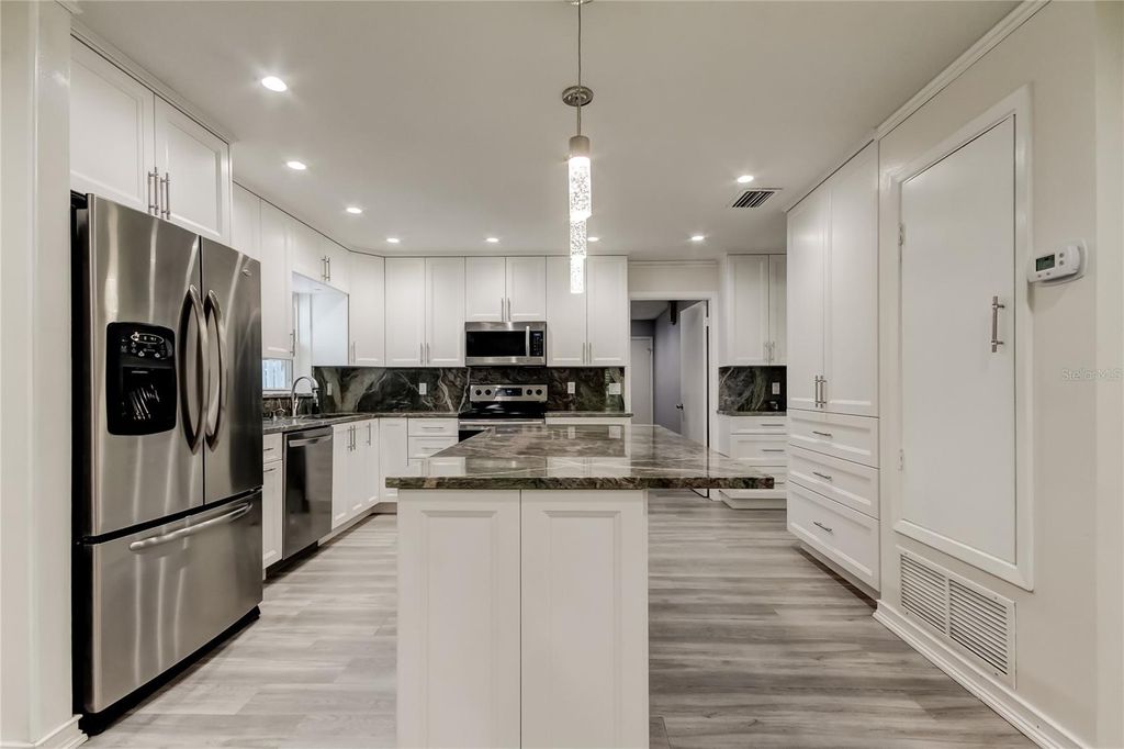 Photo of 1402 Provincetown Circle, Lutz, FL 33549 (MLS # TB8400710)