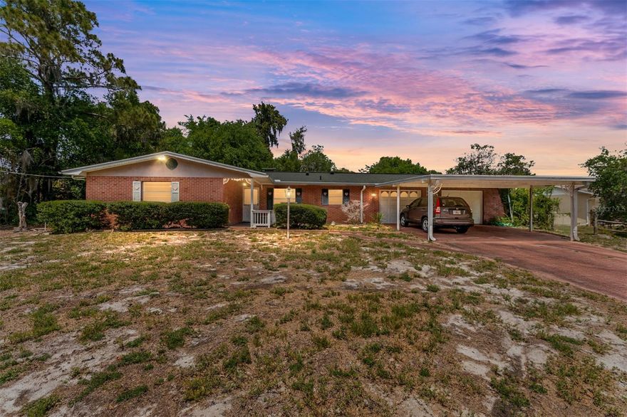 Under contract-accepting backup offers. Looking for a house on a lake with no HOA! Look no further as this home sits on a great lot with tons of potential. Featuring 3 Bedrooms and 3 Bathrooms with one of the one of the bedrooms completely separate and with a private entrance allowing unlimited options in-law suite, adu or growing family member who wants their own space. Roof, HVAC, Well and boat dock have all been updated in the last few years meaning all the main items have been taken care of, all it needs is for you to add your spin and make it your own. Feel like your in your own world with tranquil background but also just a 5 minute drive to Downtown Inverness. What a find! Call to schedule an appointment today and make this house your home.