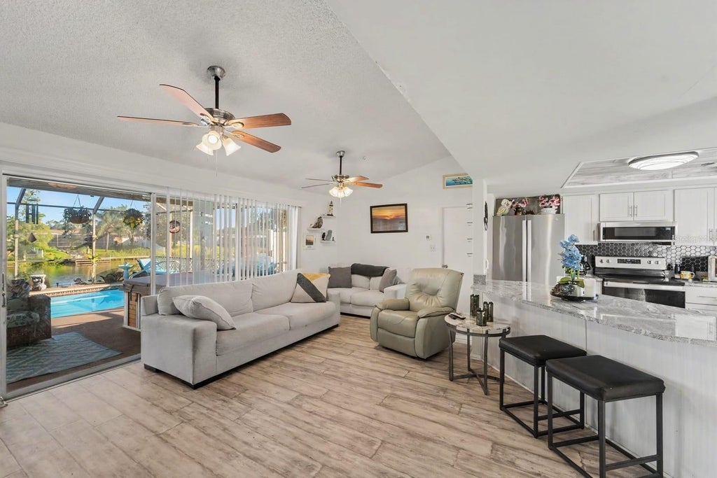 Photo of 8431 Redfield Drive, Port Richey, FL 34668 (MLS # TB8559340)