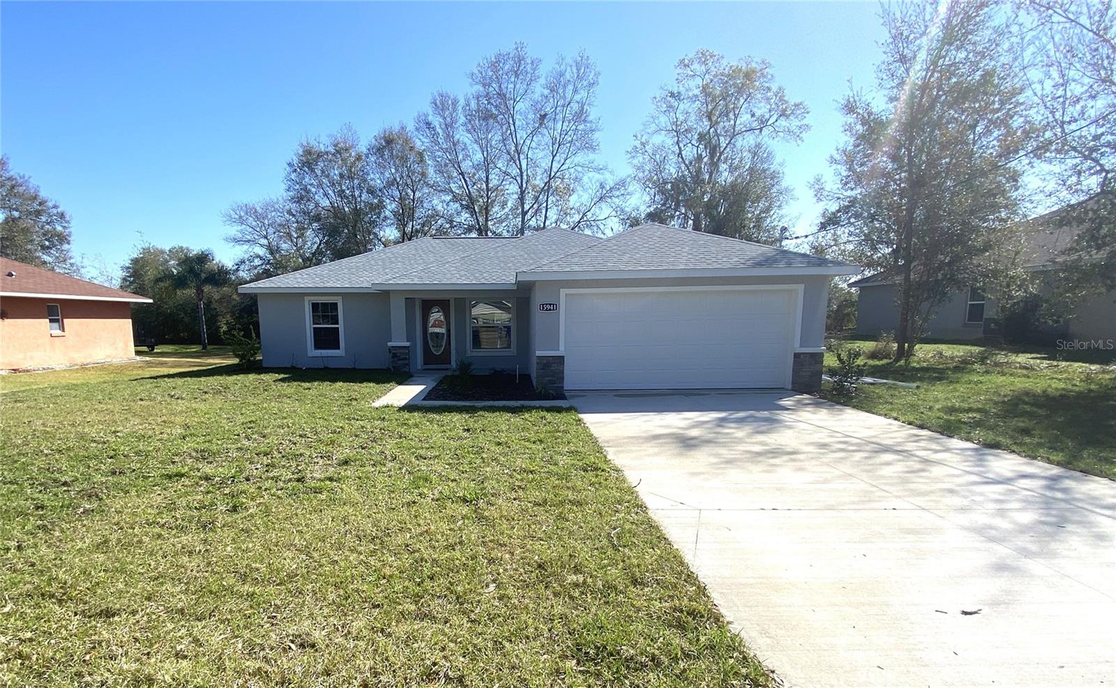 Nice 3 bed 2 bath Home Located in the family-friendly and very quiet neighborhood of Orange Blossom Hills this 3BR/2BA home is within minutes of The Villages, Ocala, shopping, dining, schools, and much more. Situated on an OVERSIZED .22 acre lot security system, an irrigation system, 2-car garage, INSIDE utility room, and covered back patio. The spacious master suite features a tray ceiling, a walk-in closet, and the master en-suite with his/her sinks, granite countertop, shaker cabinetry, and a seamless glass-enclosed walk-in shower. The spare bedrooms are spacious with a shared hall/guest bath and linen closet. From the curb appeal to the backyard, you'll fall in love with everything this home offers as the owner spared no expense. So don't wait and schedule your private tour today before it's gone! The Home Has A Year Builder Warranty.
*Looking to build your credit while renting? Look no further we provide credit reporting for all leases. More details Here
*1 Small Pet Permitted with Refundable Deposit *Breed Restrictions Apply
*Vaulted ceilings
*Open floor plan that features a BONUS Florida room
*Tile/Carpet flooring
*Washer and Dryer hook up
*Private Well for water
*Basic Lawn care and Pest Control included
*NO HOA
*Tenant to be responsible for Weeding, Shrubs
*Seeking high-quality, long-term resident.