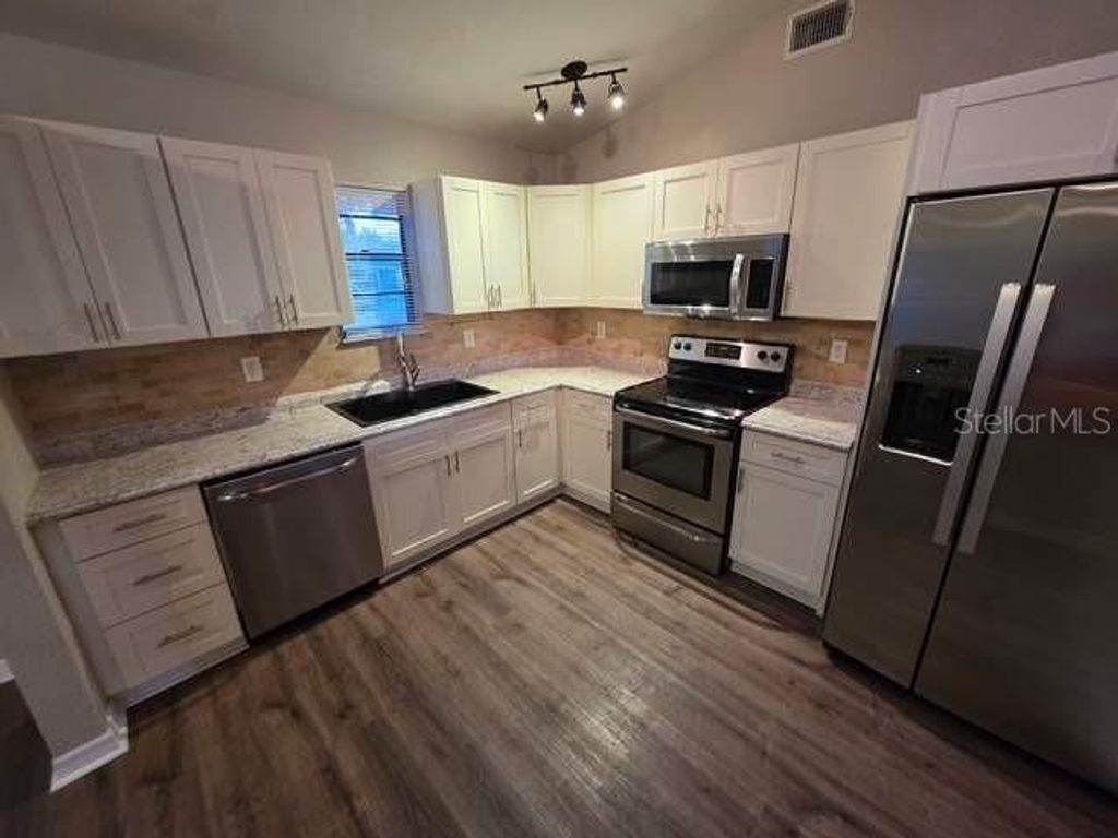 Photo of 2009 Umbrella Tree Drive, Edgewater, FL 32141 (MLS # V4948014)