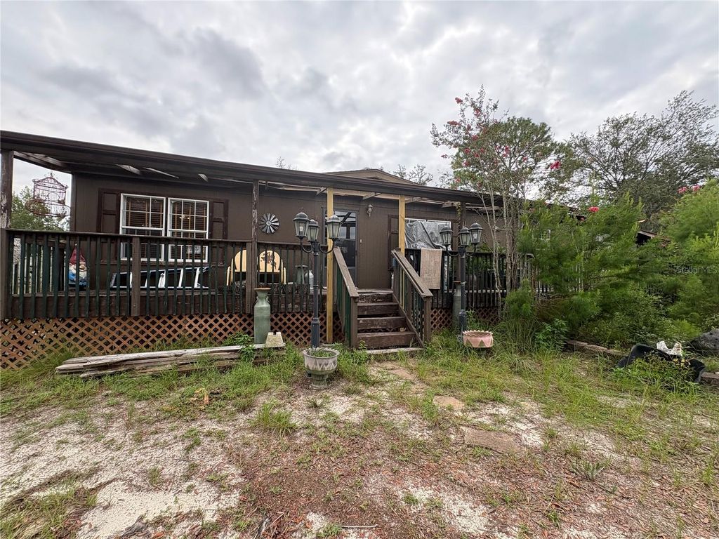 Photo of 12119 Seely Lane, Brooksville, FL 34613 (MLS # W7877521)