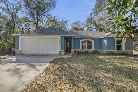 Photo of 610 N Summit Avenue, Lake Helen, FL 32744 (MLS # FC316138)
