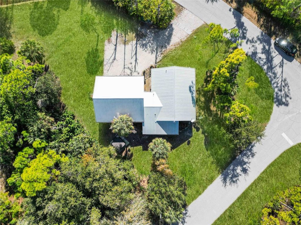 Photo of 7348 Coach Road, Port Charlotte, FL 33981 (MLS # C7521816)