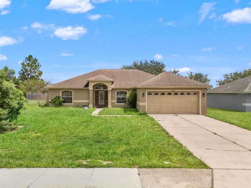 Photo of 8014 Cardinal Winds Lane, Mascotte, FL 34753 (MLS # W7888634)
