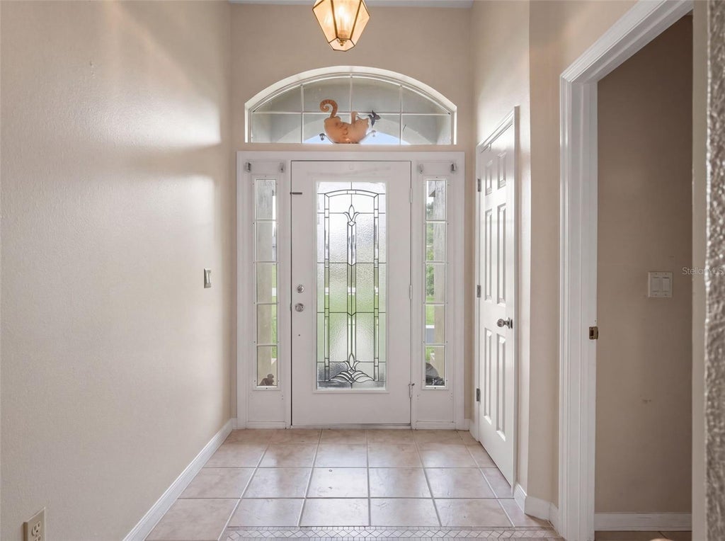 Photo of 8014 Cardinal Winds Lane, Mascotte, FL 34753 (MLS # W7888634)