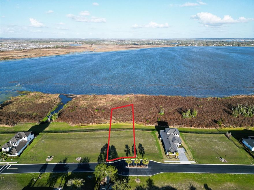 Exceptional Oversized Lakefront lot on beautiful Lake Alfred, located within the highly sought-after community of Water Ridge. This spacious homesite offers the perfect opportunity to build your custom dream home with beautiful water views and plenty of room for outdoor living. Enjoy a peaceful setting while still being close to major highways, shopping, dining, and area attractions. Water Ridge is a one-of-a-kind, upscale, gated community, with Resort-Style amenities, situated amongst 3 lovely lakes. Offering Pickleball, Tennis and Basketball courts, 3 Pools, Access to 3 Lakes, Boat Ramps, Fishing docks, Boat Storage area, a large Fitness center, Sauna and a beautiful clubhouse. 
Perfectly located between Tampa and Orlando with easy access to I-4, you’re just a short drive from Universal Studios, Disney Parks, Legoland, premier shopping, dining, and much more! This is a rare opportunity to own a premium lakefront lot in one of the area's most sought-after communities.