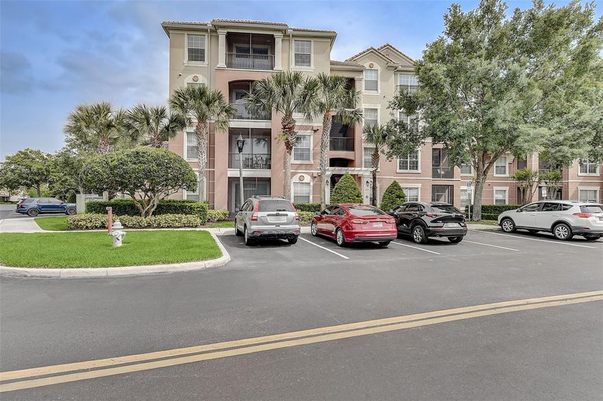 One or more photo(s) has been virtually staged. Step into luxury living at 8296 Portofino Dr Unit 103 in Champions Gate, Florida! This exquisite 3-bedroom, 2-bathroom condo awaits your arrival in the prestigious Bella Trae community. Neutral colors and immaculately maintained, revel in the tranquility of a serene pond view from your ground-floor haven. Inside, discover a seamless blend of style and comfort with tiled wet areas and plush new carpeting throughout the living spaces. The kitchen boasts sleek, tall cabinets for ample storage and gleaming stainless steel appliances including a range, refrigerator, microwave, and dishwasher. Convenience is key with a covered parking space and a storage unit complete with power and light. Plus, HOA dues cover internet, cable, water, and pest control for added peace of mind. Indulge in the Bella Trae lifestyle with exclusive access to a remarkable 12,000+ sq. ft. clubhouse featuring a state-of-the-art gym, fitness studio, zero-entry pool, media room, billiards room, bocce ball court, putting green, and an array of social activities. Nestled in the heart of Champions Gate, this property offers proximity to Disney Parks, I4, restaurants, shopping, and more. Ready for immediate occupancy and being sold as-is, seize this extraordinary opportunity for upscale living! Tenant Occupied until 2/28/2026. (Note: One photo has been virtually staged.)