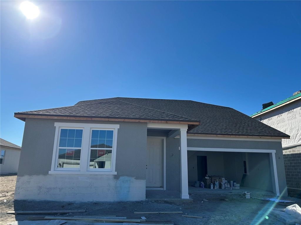 Photo of 10175 Hidden Hammock Loop, Parrish, FL 34219 (MLS # TB8439755)