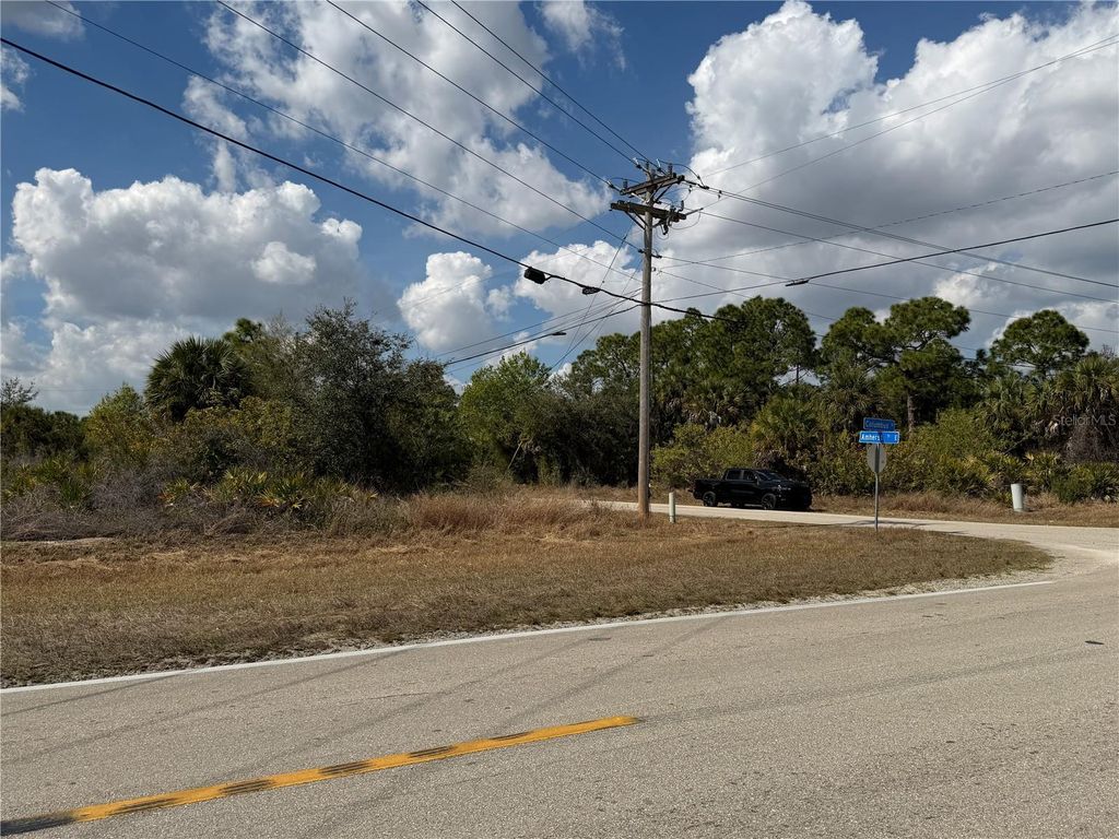 Photo of 522 Columbus Boulevard S, Lehigh Acres, FL 33974 (MLS # TB8478763)