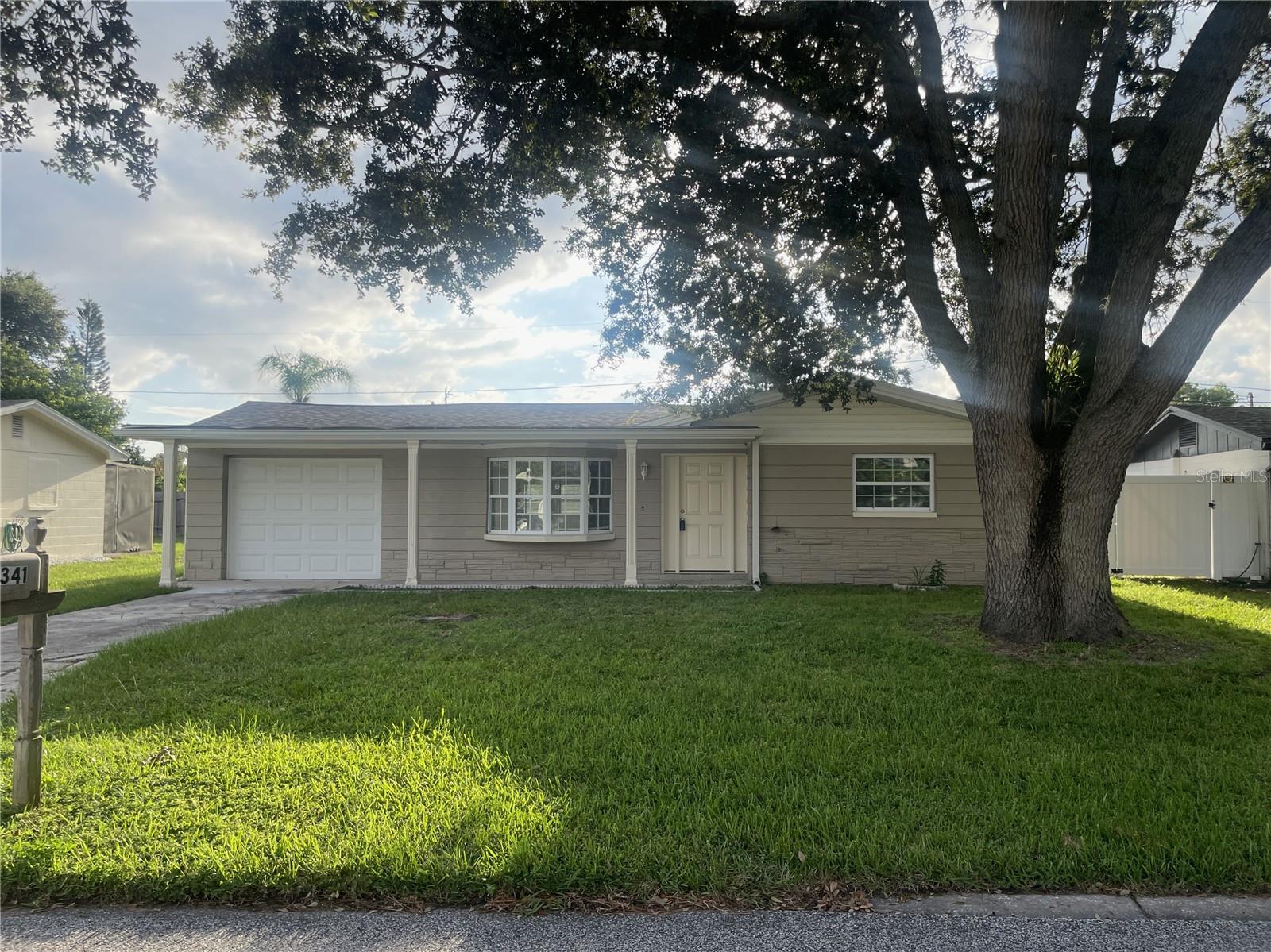RENOVATED home that is MOVE-IN READY! Unpack your bags and enjoy the NEW Kitchen, NEW Bath, NEW floors, FRESH paint, NEW Appliances, Newer Roof, Den/flex room plus a 1 car garage. Outdoors you'll enjoy a lanai and fenced backyard. NOT a flood zone. Unpack your bags and make this your new home. Call today and let's make it yours.