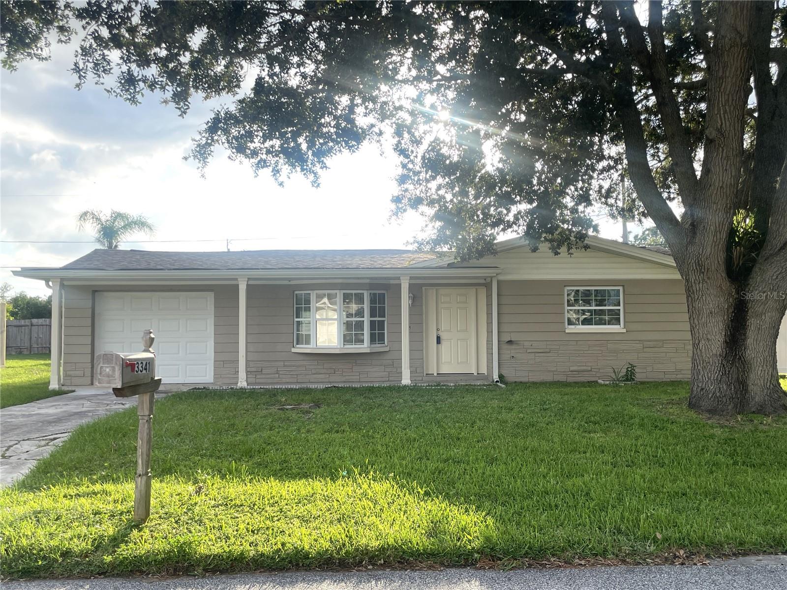 Beautifully RENOVATED home that is MOVE-IN READY! Unpack your bags and enjoy the NEW Kitchen, NEW floors, FRESH paint, NEW Appliances, Newer Roof, Den/flex room plus a 1 car garage. Outdoors you'll enjoy a lanai and fenced backyard. Unpack your bags and make this your new home. Call today and let's make it yours.