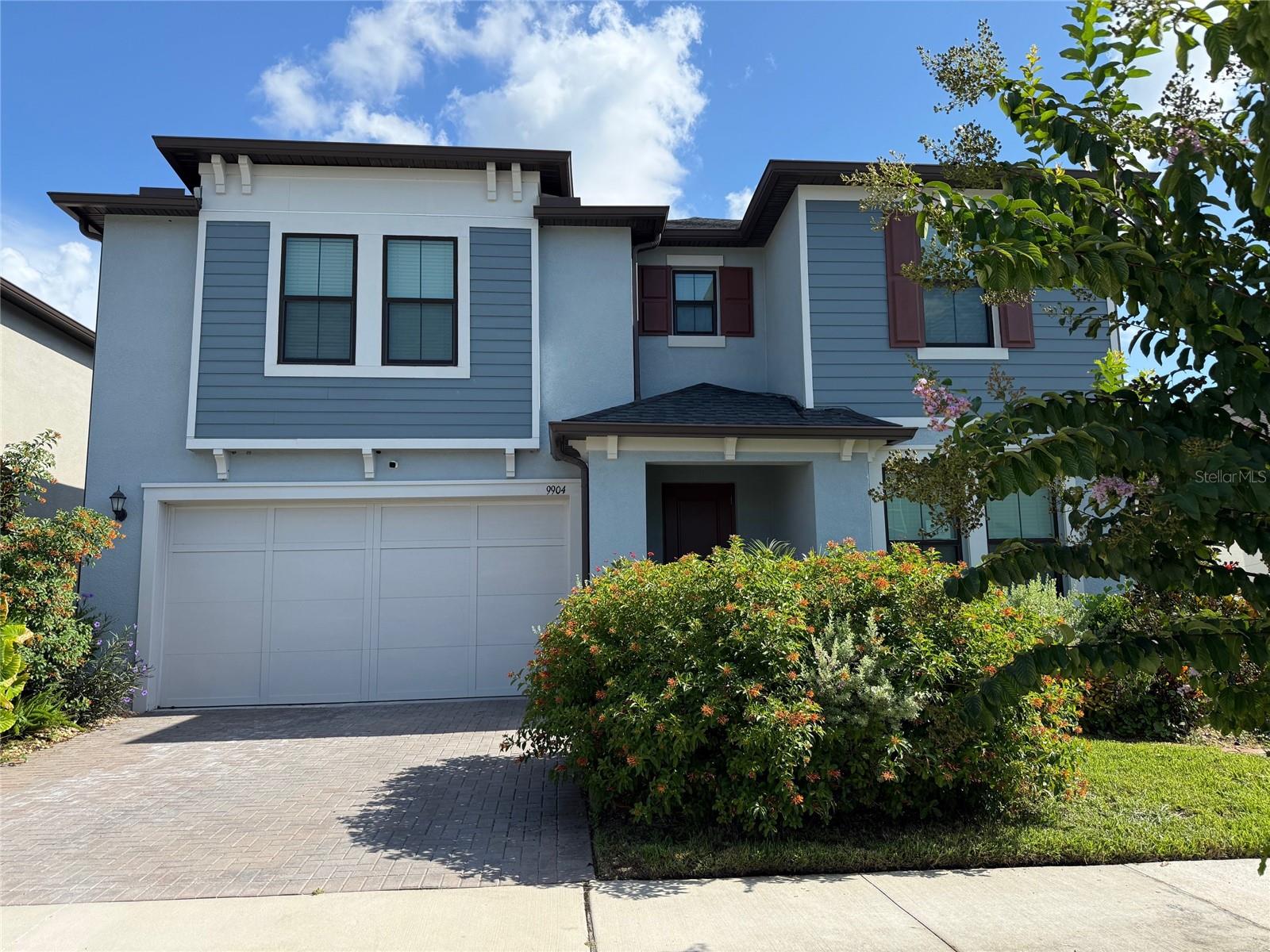 Welcome to this 2022 built 4 bedroom/2.5 bath home located in Connerton! Situated on a conservation lot with no rear neighbors, this property offers wood-look tile throughout the living space, recessed lighting in the kitchen, and a flex space that could be a 5th bedroom. The kitchen features white cabinetry and quartz counter tops, an island, a walk-in pantry, and it overlooks the open living and dining areas. The lower level has the primary ensuite with a walk-in closet (with built-in organizers), a garden tub, and a separate shower. Upstairs, the home provides three bedrooms, a loft with wet bar, and a full bathroom. The back has a covered porch and a view to the conservation/pond area. All this plus all the amenities Connerton has to offer, including a clubhouse, pool, fitness center, walking trails, and community events. Call today before it's too late! This property is eligible under the Freddie Mac first look initiative through 9/20/2025.