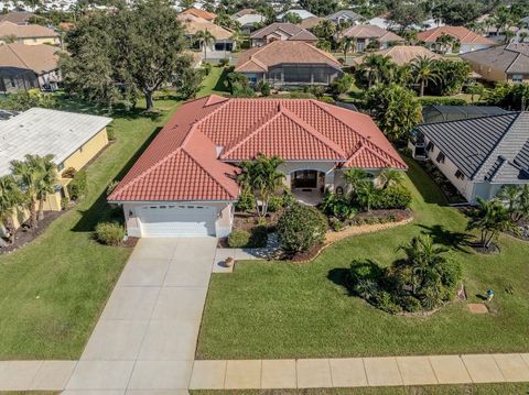 Photo of 529 Lake Of The Woods Drive, Venice, FL 34293 (MLS # N6141643)