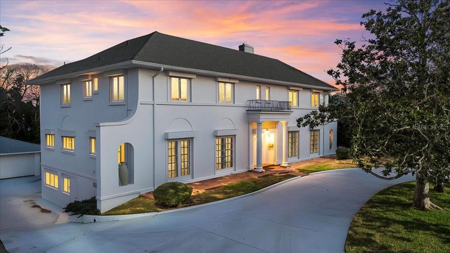 PRICED JUST BELOW A RECENT APPRAISAL! Must see to appreciate how great this property is!  One of the original Grande Dames of "old Daytona Beach" just became available!  Step into a piece of coastal history with this spacious, architecturally stunning 101-year-old riverfront home, ideally located just moments from the beach, from downtown Daytona, from downtown Ormond, and in one of the most coveted locations in the county. Rich with original character and timeless charm, this residence offers generous living spaces (think arched doorways, high ceilings, large rooms, and endless French doors and windows).  This home offers endless potential for personalization.  With a brand-new roof, some newer windows, French doors to the patio, three air conditioners - one of which is new, and endless space for storage (possibly storage for 6 cars, with a four-car detached garage and a two car attached garage), this house makes a dramatic first impression.  Add to that an actual stand-up basement that could be converted into additional living space and has its own private entrance, and you have a legacy property in Daytona that is sure to appeal to the most discriminating project-seeker.  A rare opportunity for buyers who appreciate classic architecture and envision creating their own coastal retreat, this home is ready for thoughtful updates to bring its next chapter to life. Enjoy the unbeatable location, ocean air, and the chance to restore and enhance a truly special property.  Space like this is hard to find on the beachside, as is riverfront property.  The lot across the street is being sold with the home, so do not sleep on this opportunity! All information taken from the tax record, and while deemed reliable, cannot be guaranteed.