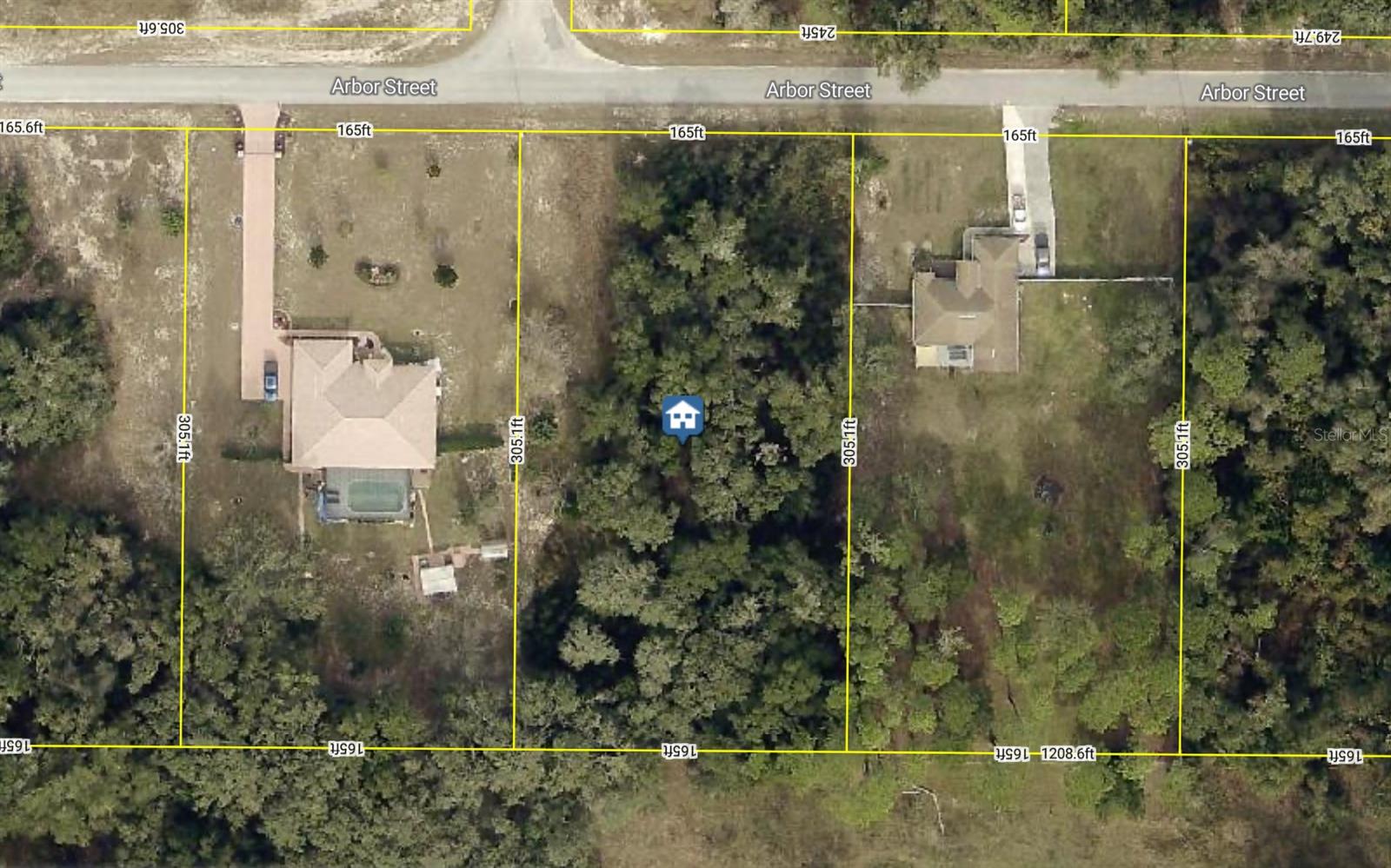 Beautiful over 1 acre on a paved street, natural Florida landscape. This area is ideal for a custom home. Lot is 165x305x165x305 nice homes in the area too. Ridge Manor Estates is one of the best investment areas! Drive by and check it out.
