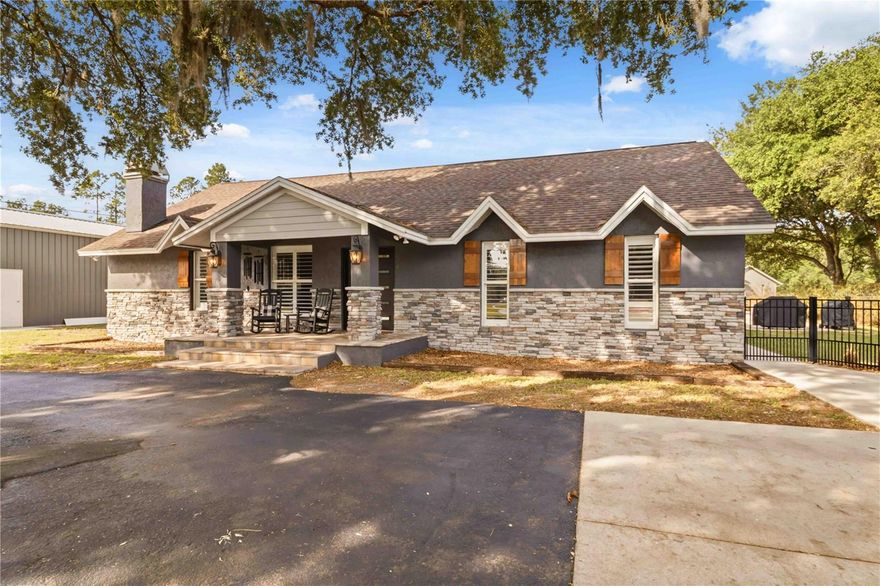 UPDATED POOL HOME ON OVER AN ACRE!! NO FLOOD ZONE! IN-LAW SUITE!
Welcome to this beautifully updated 4-bedroom, 3-bath home situated in the heart of Wesley Chapel. Offering the perfect blend of privacy, comfort, and convenience, this property features thoughtful upgrades throughout while maintaining a warm and inviting feel. The open layout provides plenty of room for entertaining and everyday living, with abundant natural light and spacious bedrooms designed for both relaxation and functionality. No details were missed when the gourmet kitchen was masterfully designed, making it as functional as it is inviting. 
The oversized Master Bedroom and bath offer an exquisite feel while providing plenty of space for an office or sitting area. 
The 4th bedroom has a full bath and bonus room making it the perfect in-law suite. Plantation shutters adorn the windows. The entire home was updated with ceramic plank tile. 
Step outside to your own private backyard retreat featuring a heated saltwater pool, ideal for year-round enjoyment. The expansive over acre lot offers endless possibilities with plenty of room for outdoor activities, gardening, or storing recreational vehicles and toys. A detached 2-car oversized garage provides ample space for vehicles. A very large 2 bay barn was built in 2025 that is suitable for just about any of your wants and needs. Add all of this together and it makes this property just as practical as it is beautiful. 
Conveniently located just minutes from The Grove at Wesley Chapel, The Tampa Bay Outlet Mall, Wiregrass Mall, Advent Center Ice. This is also a prime location for A Rated schools and Healthcare! Johns Hopkins Childrens Hospital will be opening in 2027. The interstate is also a benefit as you can get to Tampa Airport, Downtown Tampa in less than 30 minutes. Plenty of sporting facilities are right here in your backyard, from the Wiregrass Sports Campus to Advent Health Center Ice, there are plenty of opportunities for just about anything. Professional Sports... Tampa Bay Buccaneers and Tampa Bay Lightning are less than 30 minutes away and Tampa Bay Rays are just over the bridge beyond that into St Petersburg. 
Enjoy the best of peaceful acreage living while still being close to everything in Wesley Chapel and beyond! Make your appointment today!!