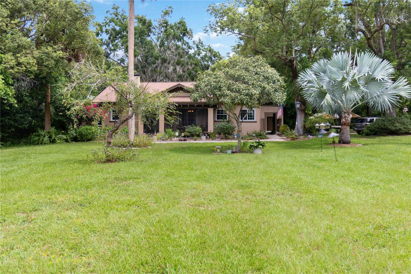 Experience the perfect blend of historic charm and modern convenience in this stunning 1923 Craftsman home. This 3-bedroom, 2-bathroom residence is nestled on a private, lushly landscaped lot.
Step inside to discover preserved, unpainted original hardwood floors and trim, which have been meticulously cared for throughout the home. The living room features a cozy fireplace and flows into a formal dining room and a sun-filled family room with elegant French doors.
The large, updated kitchen is a chef's dream, boasting a spacious prep island, beautiful butcher block countertops, stainless steel appliances, and abundant cabinet space. The primary bedroom is a peaceful retreat with an en suite bathroom and a sitting room that can easily be transformed into a walk-in closet. Two additional spacious bedrooms share a well-appointed bathroom and an indoor laundry room.
Adding to the home's functionality are a large attic for storage and a screened-in porch perfect for relaxing.
This property presents an incredible opportunity for multigenerational living or potential rental income, thanks to the converted garage. This separate living space offers a studio layout with a private full bath and kitchenette.
The outdoor oasis is surrounded by majestic oak trees and includes a large green space and a deck for entertaining. This private and peaceful home is conveniently located. Schedule your tour today!