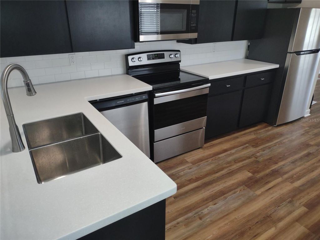 Photo of 1213 NW 8th St, Winter Haven, FL 33881 (MLS # TB8425773)