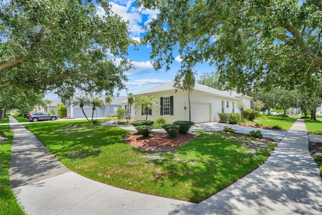 Photo of 8003 Belshire Drive, Orlando, FL 32835 (MLS # O6423936)