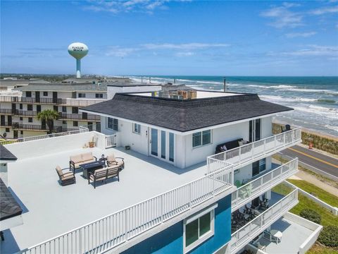 Photo of 3510 S Ocean Shore Boulevard #406, Flagler Beach, FL 32136 (MLS # O6398396)