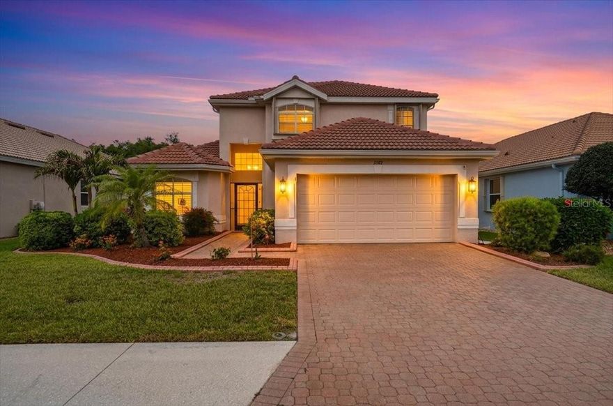 Welcome to this beautifully maintained and thoughtfully updated two-story single-family home in the highly desirable Stoneybrook community of Venice. From the moment you arrive, you’ll be impressed by the exceptional curb appeal, featuring lush landscaping, a paver brick driveway, and a charming walkway leading to both a welcoming front porch and an enclosed lanai. A two-car garage and an elegant glass front door invite you inside.
Step into a light-filled foyer that opens seamlessly to the living room, family room, and a beautifully updated kitchen. The kitchen is a true centerpiece, showcasing stone countertops, stainless steel appliances, rich cabinetry, a new refrigerator (2025) and an L-shaped peninsula with an eat-at bar—perfect for casual dining or entertaining. Both the dining and living rooms feature sliding glass doors with Plantation shutters leading out to the Lanai and pool area. Inside is freshly painted. Enjoy your private outdoor oasis with a caged pool overlooking a peaceful preserve, offering both privacy and serene views. The pool area is ideal for relaxing or entertaining and includes a pool heater (2025) and a child safety fence for added peace of mind. The covered lanai provides a perfect under-roof space for dining, lounging, or watching TV while enjoying the Florida lifestyle. Home also has hurricane windows and shutters.The spacious first-floor primary suite is a true retreat, entered through grand double doors and featuring a large walk-in closet with custom built-ins. The ensuite bathroom offers dual sinks, a soaking garden tub, a large walk-in shower, and a linen closet. Sliding glass doors—also finished with plantation shutters—lead directly from the primary bedroom to the lanai.
Additional features on the main level include a convenient half bath, a well-equipped laundry room with sink and storage, and access to the two-car garage. Upstairs, a carpeted staircase leads to a versatile loft/second living area, a full bathroom with dual sinks and a tub/shower combination, and two generously sized guest bedrooms—each with plantation shutters.
The home features tile flooring throughout the main living areas, kitchen, laundry room, and bathrooms, with carpet in the bedrooms and upstairs living space. High ceilings enhance the open, airy feel throughout. Major system updates include a new roof (2023) and new AC (2023), offering comfort and confidence for years to come.
Located in the gated Stoneybrook community, residents enjoy resort-style amenities including a clubhouse, fitness center, heated pool and spa, tennis and basketball courts, baseball field, playground, and scenic walking trails. Ideally situated just minutes from I-75, shopping, dining, top-rated schools, and the beautiful Gulf beaches of Venice, this home offers the perfect blend of style, updates, and Florida lifestyle living.