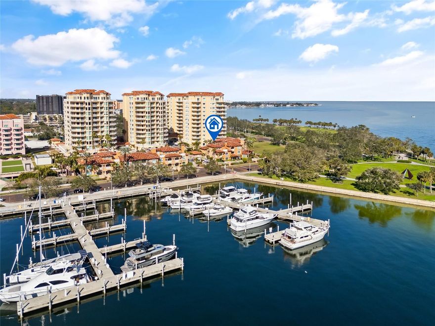 Capitalize on owning a city home at Vinoy Place Condos, one of Downtown St. Petersburg, Florida's most prestigious gated waterfront communities. This exclusive townhome is one of only ten in the enclave, offering a perfect balance of privacy, luxury, and fantastic views of the Vinoy Basin, Tampa Bay, and the lively downtown waterfront. The exciting news is that it has a two-car garage and a private courtyard that can open to the front, making it feel like a single-family residence. This corner residence features 3,750 square feet on three levels, three expansive bedrooms, and three and a half baths connected by a private elevator. Large windows allow natural light to flood the space and balconies on each level; the home is bathed in sunlight and designed for seamless indoor-outdoor living. Recently updated with a new roof (2022) and freshly painted interiors, this home is a blank canvas, ready for your personal touch. The first floor offers an open layout with a defined kitchen, dining, and living area that retains its original charm while providing ample opportunity for modern updates. The generously sized primary suite on the second floor is a true retreat, featuring serene water views, a huge walk-in closet, and a private sitting area. This level also includes a versatile office/den and a guest suite with its en-suite bath. The third floor has an additional bedroom with an en-suite bath, a built-in bar, custom cabinetry, and a mini-fridge! Perfect for family and friends visiting from out of town for one of St Pete's popular weekend festivals. OR create a new entertainment space, including the large outdoor balcony with wonderful views and holiday fireworks! Vinoy Place residents enjoy 24-hour gated security, two resort-style pools with spas, and a clubhouse, providing all the amenities for luxurious, carefree living. Just next door, the renowned Vinoy Resort and Golf Club offers convenient additional entertainment. Vinoy Park, the marina, and the vibrant shops and restaurants of Beach Drive are steps away; this townhome offers the ultimate in downtown waterfront living. Don't miss your chance to live in a home environment with the "lock and go" feature! Schedule your private showing today!