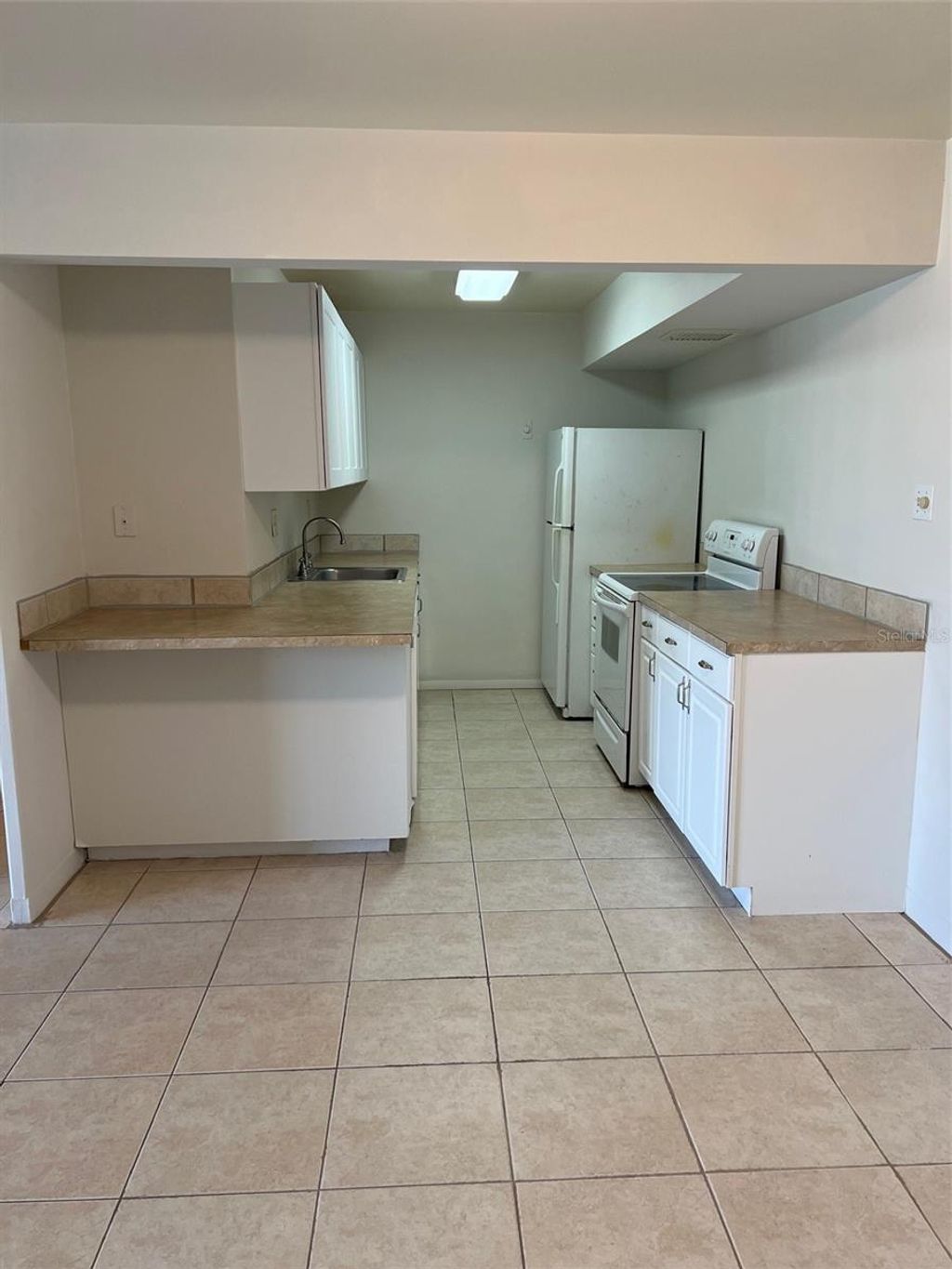Photo of 10355 Paradise Boulevard #202, Treasure Island, FL 33706 (MLS # TB8436055)
