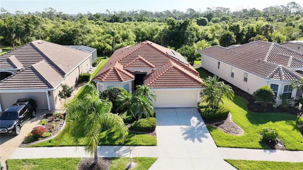 Photo of 5174 Pine Shadow Lane, North Port, FL 34287 (MLS # C7530046)