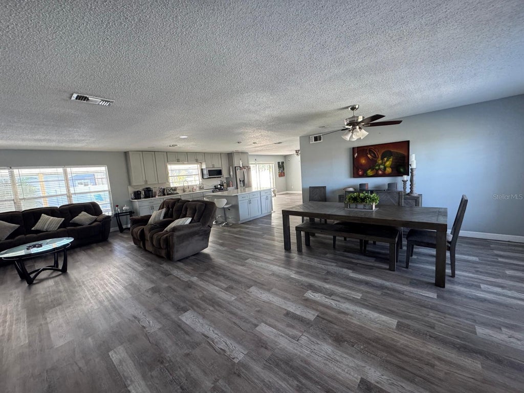 Photo of 1814 Paradise Drive, Kissimmee, FL 34741 (MLS # O6451465)