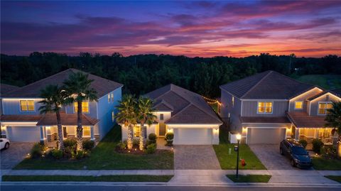 Photo of 1111 Oak Bluff Drive, Davenport, FL 33837 (MLS # O6424339)