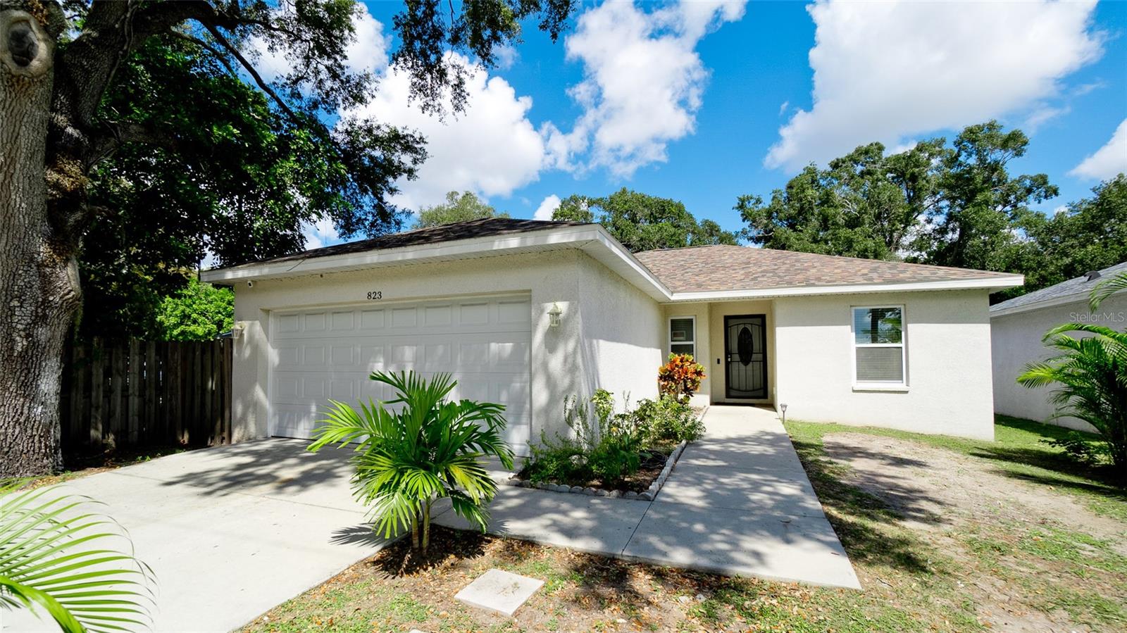 Welcome to this delightful home located in the heart of Bradenton! With its modern design and inviting charm, this property is a fantastic opportunity for a comfortable living or investment. Enjoy cooking in this kitchen featuring shiny granite countertops, a modern tile backsplash, and stainless steel appliances, including a glass cooktop range, microwave, and refrigerator. The open floor plan and spacious layout enhance comfort and flow, making it perfect for gatherings and everyday living. Porcelain flooring throughout the house adds a touch of sophistication. The large backyard is ideal for entertaining, family gatherings, barbecues, or even expanding the home—endless possibilities await! Conveniently situated near amenities, schools, parks, and shopping centers, you'll love the easy access to everything you need. With no HOA, CDD, or deed restrictions, you can bring all your toys, including RVs and big trucks, for added convenience. This charming home is ready for you to make it your own. Don’t miss the chance to experience the perfect blend of comfort and convenience in beautiful Bradenton!