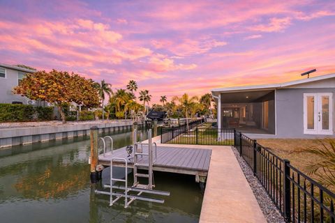 Photo of 765 Saint Judes Drive N, Longboat Key, FL 34228 (MLS # A4683420)