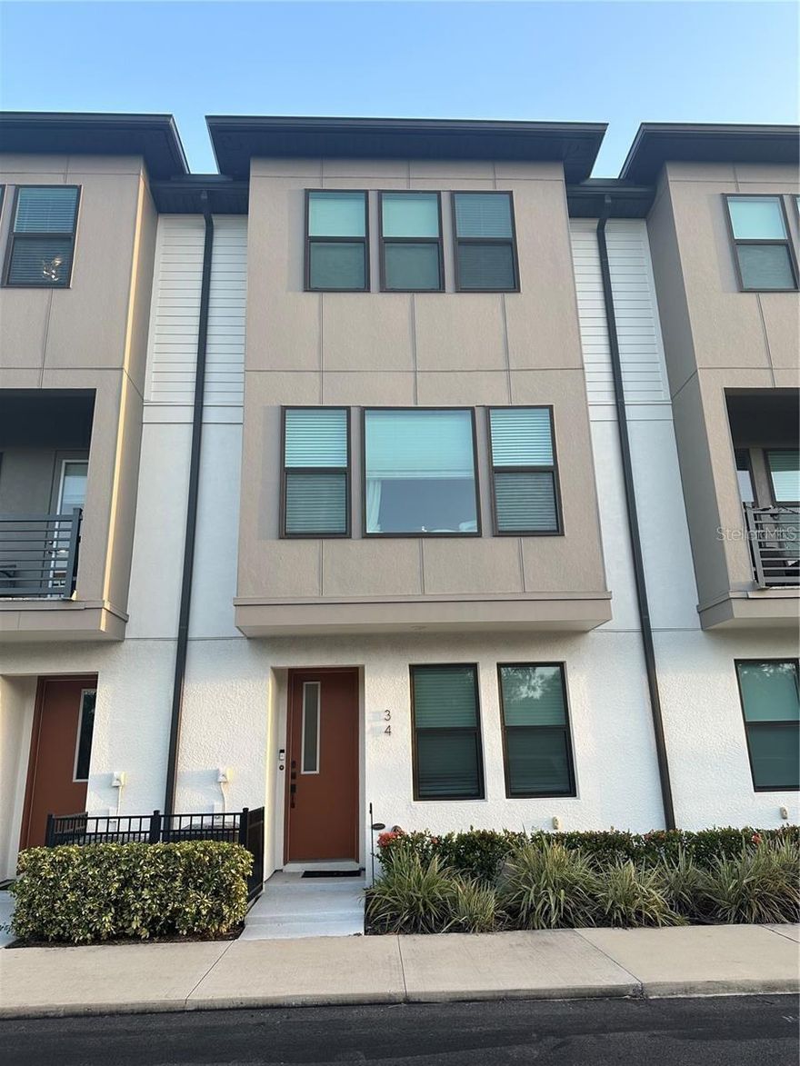 One or more photo(s) has been virtually staged. Luxury Townhome for Rent in Tampa’s Most Sought-After Location.
 
Experience urban, effortless, upscale living in this stunning 3-bedroom, 3.5-bath David Weekley townhome.  Newly built in 2022, this exclusive community is situated in the highly desirable Westshore Village. Meticulously cared for by its owner, this turnkey rental offers modern design, premium finishes and maintenance free living.
Designed with both style and function in mind, the open-concept second floor serves as the main living space, featuring a sleek chef’s kitchen with quartz countertops, crisp white cabinetry, stainless steel appliances, a gas range, and a large center island—perfect for entertaining or everyday living. The kitchen flows seamlessly into the dining and living areas, accented by rich wood flooring and abundant natural light.

Upstairs, two spacious bedrooms each offer private en-suite bathrooms and walk-in closets, while custom closet built-ins in four closets elevate both organization and design. The first-floor bedroom with en-suite bath provides ideal flexibility for guests, a home office, or a private retreat. The spacious garage is enhanced with an electric vehicle charging station, blending cutting-edge technology with everyday convenience.

Residents of Westshore Village enjoy exclusive access to a resort-style heated pool with cabanas, an outdoor kitchen, fire pit, and private dog park. 

Located just steps from Raymond James Stadium and Steinbrenner Field (home of the Rays this season), only 5 minutes from Tampa International Airport, and moments from International Plaza’s world-class shopping, Mid-town Tampa, dining, and entertainment. With easy access to downtown Tampa, and St. Petersburg, this home offers a seamless commute and an unmatched lifestyle.

Don’t miss this exceptional opportunity to lease a luxury, turnkey townhome in one of Tampa’s most desirable locations. Schedule your private showing today and make this stunning residence your next home.