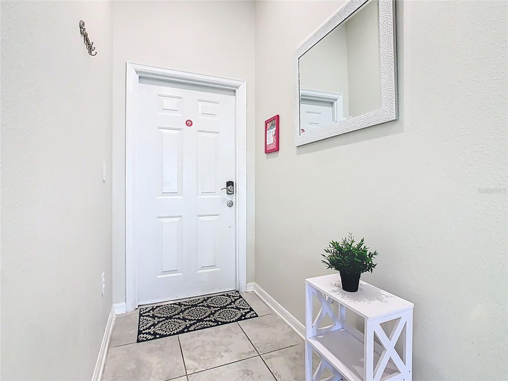 Photo of 3150 Paradox Circle #405, Kissimmee, FL 34746 (MLS # O6354937)
