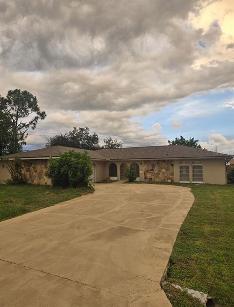Photo of 23102 Maclellan Avenue, Port Charlotte, FL 33980 (MLS # O6338276)
