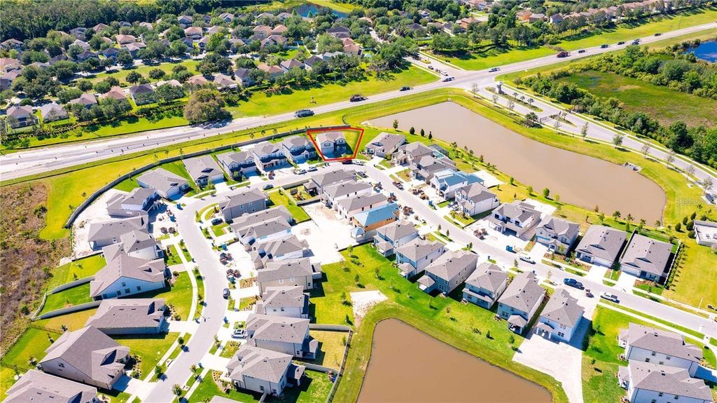 Photo of 7360 Pool Compass Loop, Wesley Chapel, FL 33545 (MLS # TB8486698)