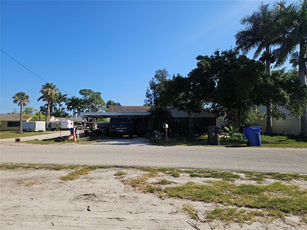 Photo of 609 1st Avenue NW, Ruskin, FL 33570 (MLS # TB8520119)