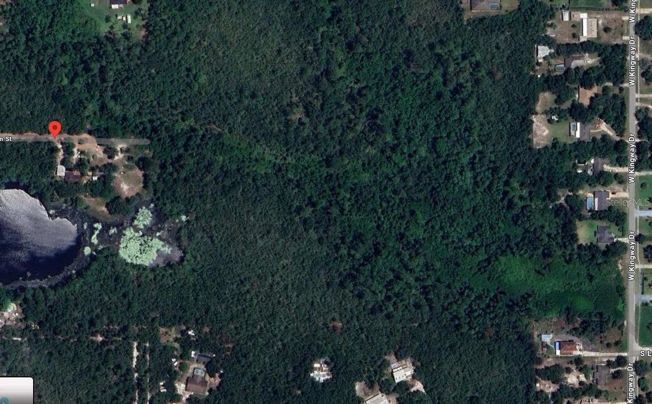 Rare Opportunity! 2.5-Acre lot in Deltona.
Discover a once-in-a-lifetime chance to own this beautiful, serene 2.5-acre property. Imagine the potential— Step into your private sanctuary with this stunning wooded lot, boasting its own unique microclimate. Imagine waking up to the serene sounds of birds chirping, surrounded by lush greenery and natural beauty.
Enjoy the high and dry terrain, and a prime location in a peaceful residential neighborhood. Ideal for those seeking a countryside lifestyle, yet close to the city for convenience. Surrounded by great fishing lakes, this lot is perfect for a permanent residence or a weekend retreat.
Zoned for site-built homes, it’s ready for your vision. While access will need to be established, Florida statutes ensure properties cannot be denied access. This creates a golden opportunity to secure this incredible piece of land to build your dream home.
Convenient location to I-4 and State Route 415, 30-40 minute drive to Daytona Beach, New Smyrna Beach and downtown Orlando. Close to shopping and restaurants, AdventHealth Fish Memorial Hospital, Blue Spring State Park and Lake Mary corporate corridor. Don’t miss this pristine property—create your dream home or investment today!
