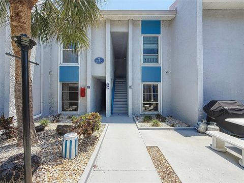 Photo of 230 Medallion Boulevard #G, Madeira Beach, FL 33708 (MLS # TB8383612)