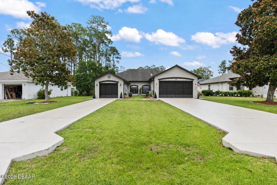 Photo of 12 Emmons Lane, Palm Coast, FL 32164 (MLS # V4949967)
