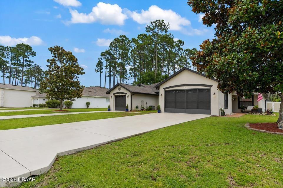 Photo of 12 Emmons Lane, Palm Coast, FL 32164 (MLS # V4949967)