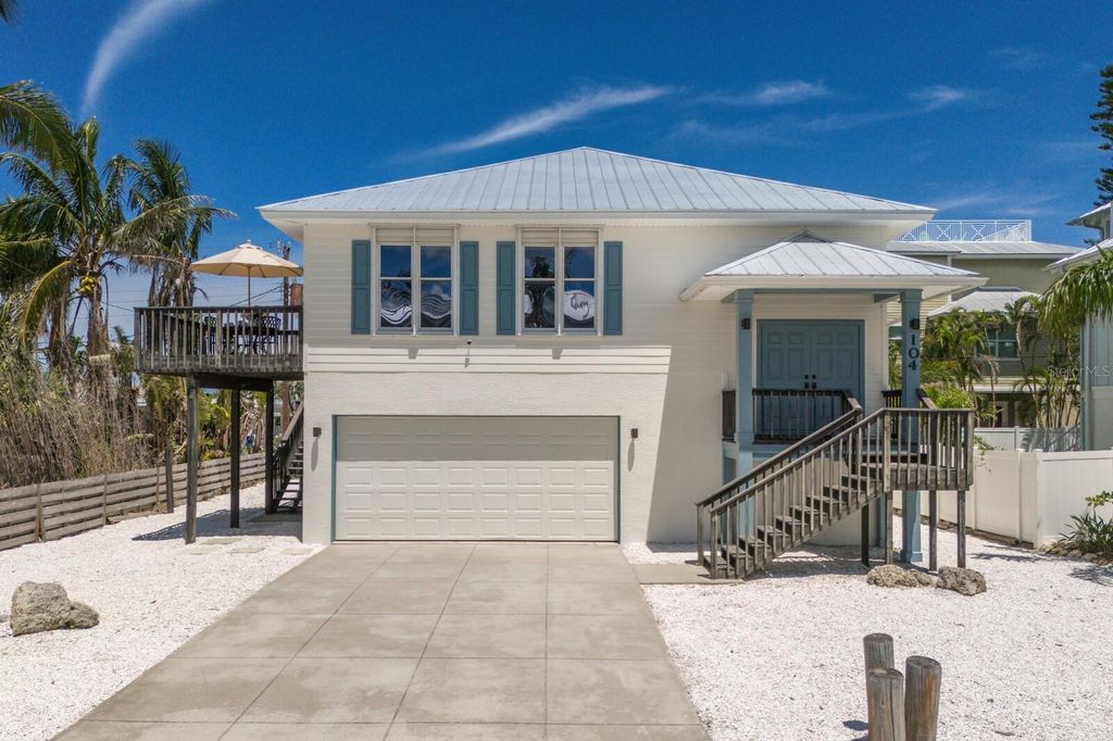 Photo of 104 77th Street, Holmes Beach, FL 34217 (MLS # A4658579)