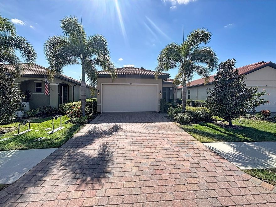 Adorable coast in Toscana Isles. The 1544 sq ft great room plan is built with a tile roof and features a brick paver driveway and COVERED SCREENED FRONT & BACK LANAI. Crown molding, Tile throughout the wet area and the office, BRAND NEW LAMINATE FLOORS in two bedrooms, FRESH PAINT INTERIOR THE WHOLE HOUSE. ENERGY-SAVING MATERIALS ARE FILLED TOP OF THE CEILING OF THE GARAGE AND THE GARAGE DOOR. Stainless appliances, light bright cabinets, and quartz kitchen countertops, 18" are just some of the many features in this light and airy home. The generous primary features a large walk-in closets. The plan is a 2 bedroom, 2 bath with an office, and a 2 car garage, Toscana is a lawn maintenance included, gated community. Amenities include a heated community pool, club room, and fitness center, all in an 8,000 sq ft Clubhouse. A community designed for the active lifestyle, including fishing, kayaking, and canoes on a 60 acre lake. All centrally located, Pineview school 7 miles, Sarasota Memorial Hospital Venice 2 miles, Laurel Nokomis School 3 miles, Nokomis Beach 7 miles, Venice Downtown 7 miles... 177 Villoresi Blvd is a house located in Sarasota County and the 34275 ZIP Code. This area is served by the Sarasota attendance zone.