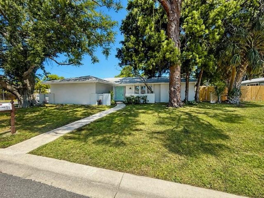 Photo of 13999 80th Avenue, Seminole, FL 33776 (MLS # TB8501806)