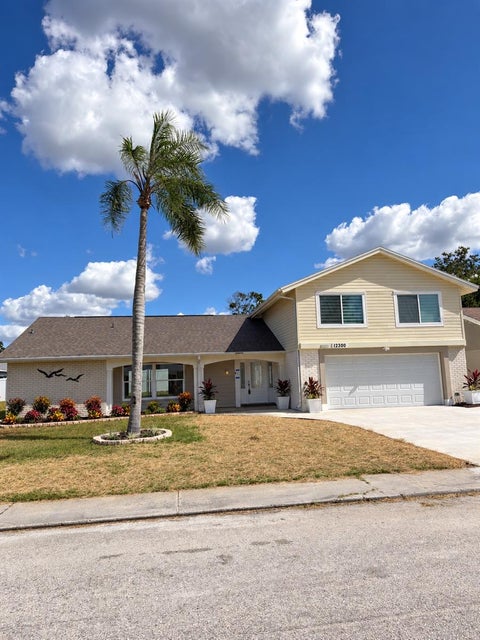 Photo of 12300 Quail Run Row, Hudson, FL 34667 (MLS # W7890566)