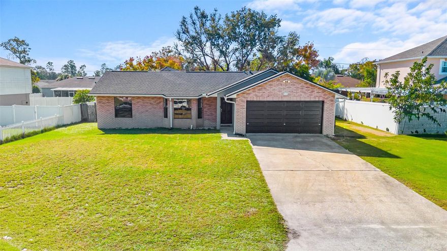 One or more photo(s) has been virtually staged. Welcome to this well-maintained brick 3-bedroom home featuring a comfortable split floor plan that offers privacy and functionality. As you enter, you are welcomed by a bright living room with beautiful bay windows that bring in plenty of natural light. The home offers a separate dining room and an additional spacious bonus room, approximately 620 square feet and fully permitted, currently used as a home gym but suitable for a game room, media space, hobby area, playroom, or expanded living space. This property has been carefully maintained with major updates already completed, including a new high-quality garage door, a new roof, new gutters, new soffit, the permitted bonus room, and a well-maintained septic system, making this a low-stress, move-in-ready home. The location provides excellent convenience, just five minutes from retail stores/hypermarkets/supercenters, surrounded by fast food and convenient stores, only ten minutes from I-4, and thirty minutes from Daytona Beach. This home offers a great blend of comfort, updates, and accessibility in the heart of Deltona.